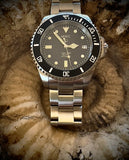 MWC 24 Jewel 300m Automatic Military Divers Watch with Sapphire Crystal and Ceramic Bezel on a Matching Stainless Steel Bracelet